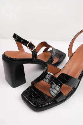 SERGIO STRAPPY SANDALS WITH BLOCK HEEL IN BLACK CROCO PATENT